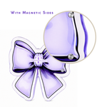 Bow-shaped lash strip holder with built-in tweezers magnets designed to keep lash tools and extensions organized for lash artists
