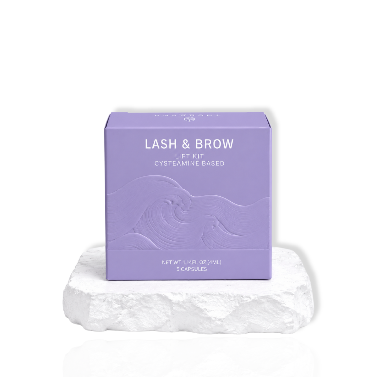Lash and Brow Lift Kit cysteamine based in a purple box labeled with 5 capsules displayed on a white surface.