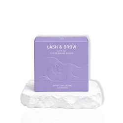 Lash and Brow Lift Kit cysteamine based in a purple box labeled with 5 capsules displayed on a white surface.
