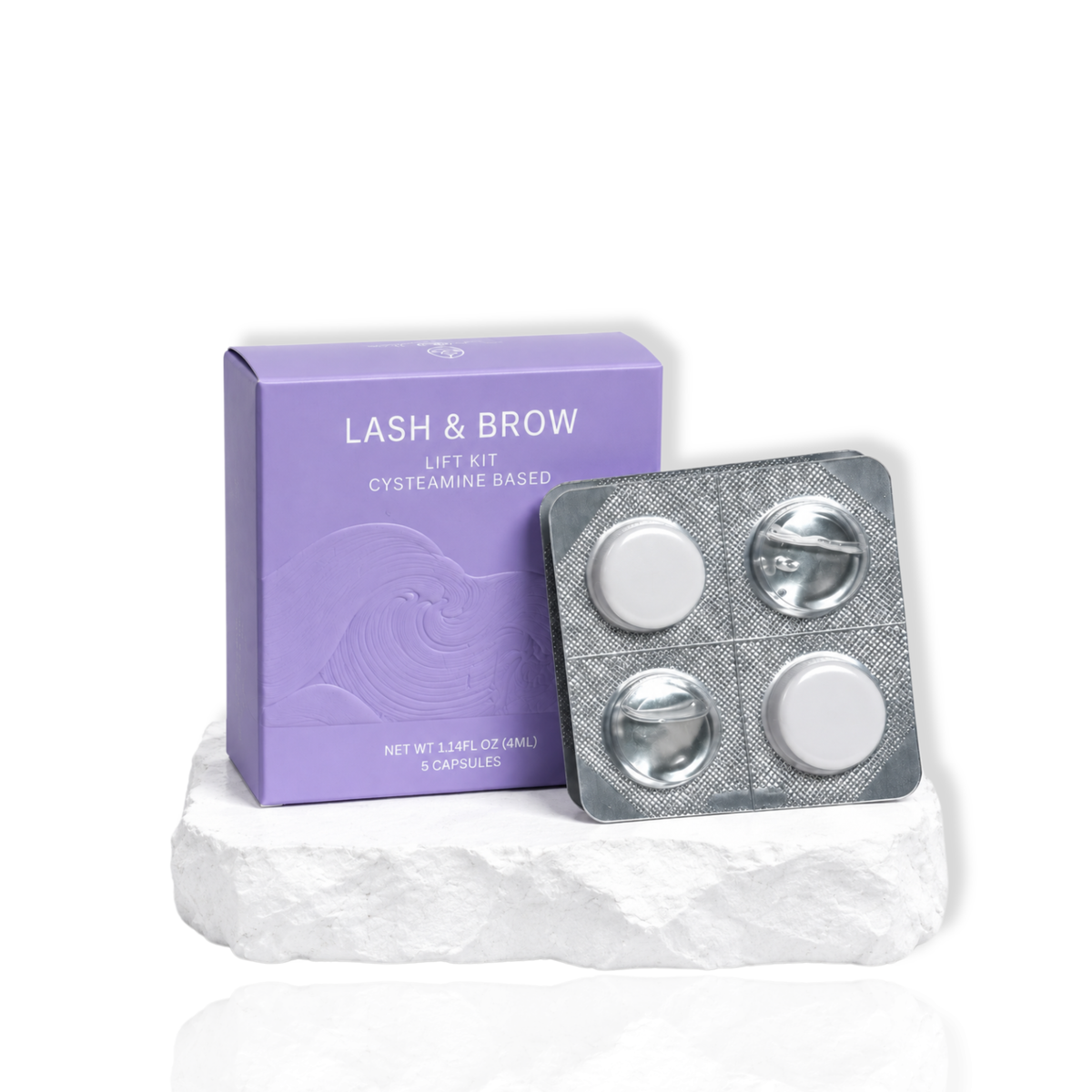 Lash and Brow Lift Kit cysteamine based with a purple box and five lash lift capsules displayed on a white surface.