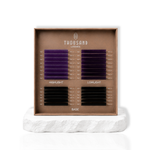 The Iris Edit color lash tray featuring smoky lilac and aubergine inspired purple lash spikes with black base lashes for custom lash mapping.