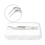 Thousandlashes M Narrow silver lash tweezer with close-up view of the curved tips.