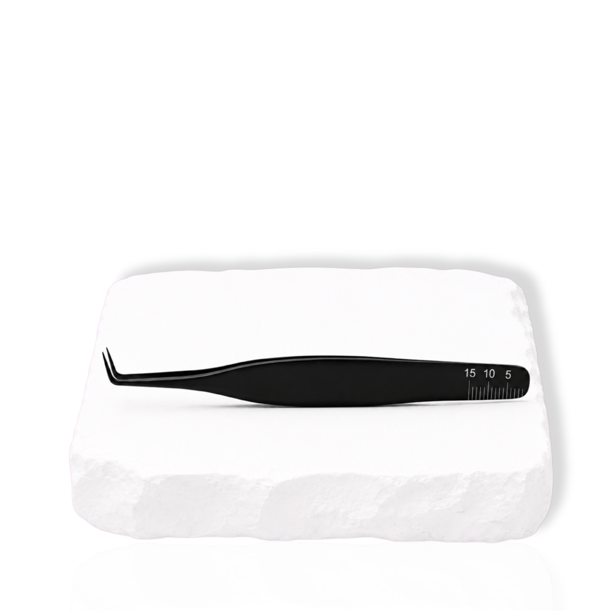 Thousandlashes Noir Collection 90-degree tweezer on a white stone surface.
