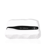 Thousandlashes Noir Collection tweezer on a white stone surface.