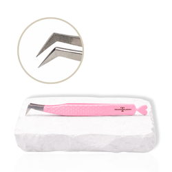 Pink Thousandlashes angled lash tweezer with close-up view of the tip on a white stone surface.