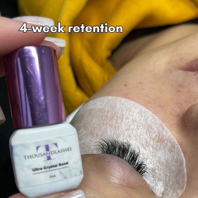 Ultra Crystal Bond adhesive bottle with lash retention result
ThousandLashes Ultra Crystal Bond Lash Adhesive shown with eyelash extensions after 4-week retention for Classic Hybrid and Volume lash sets