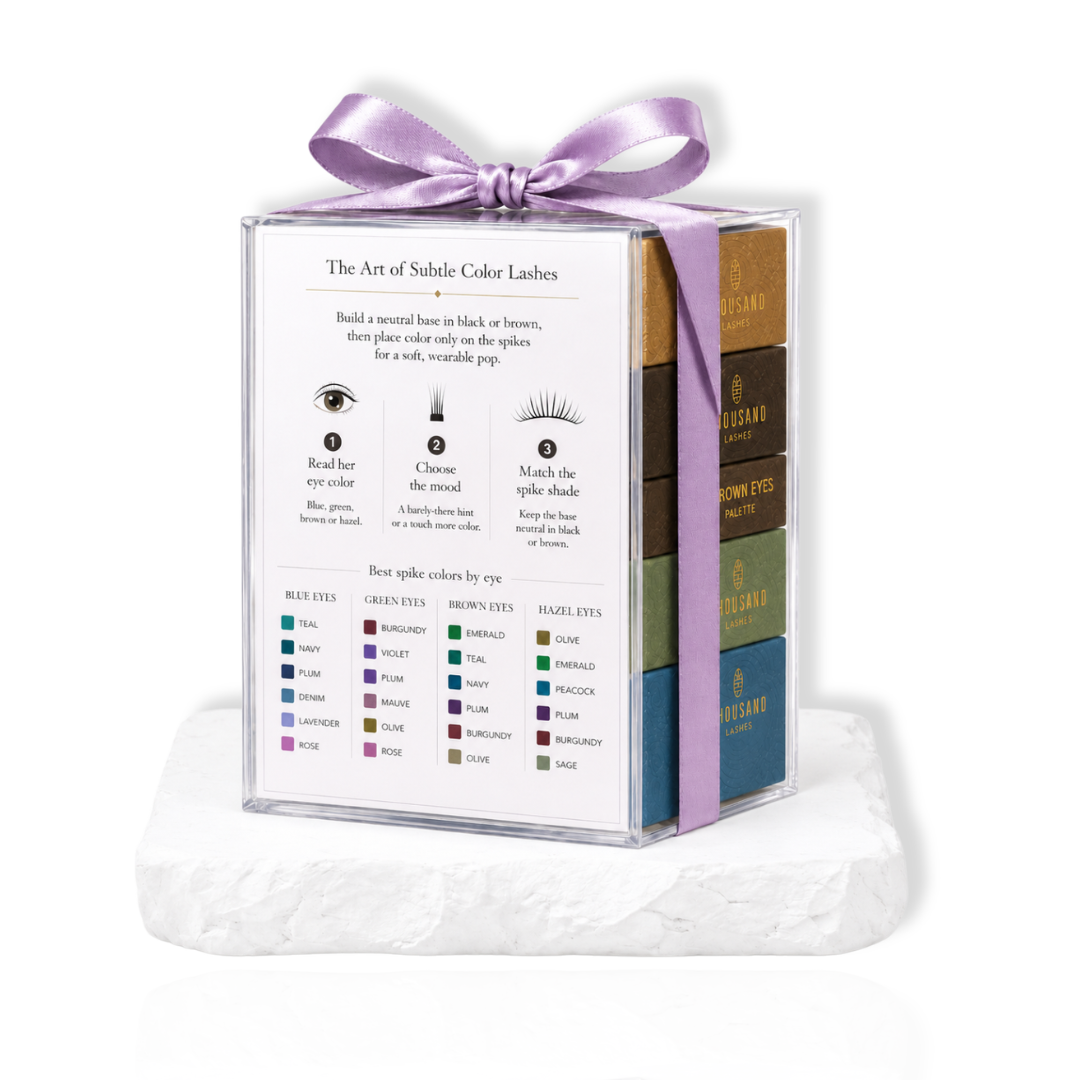 The Iris Edit wearable color lash collection packaging showing product details and color options on a white stone base.