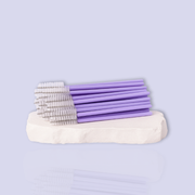 purple disposable spoolie brushes